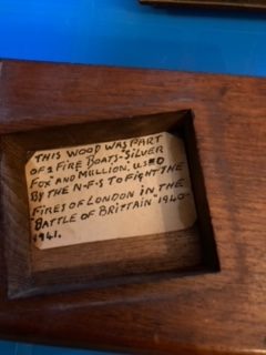 Note inside book ends using wood from fireboats Silver Fox and Mullion